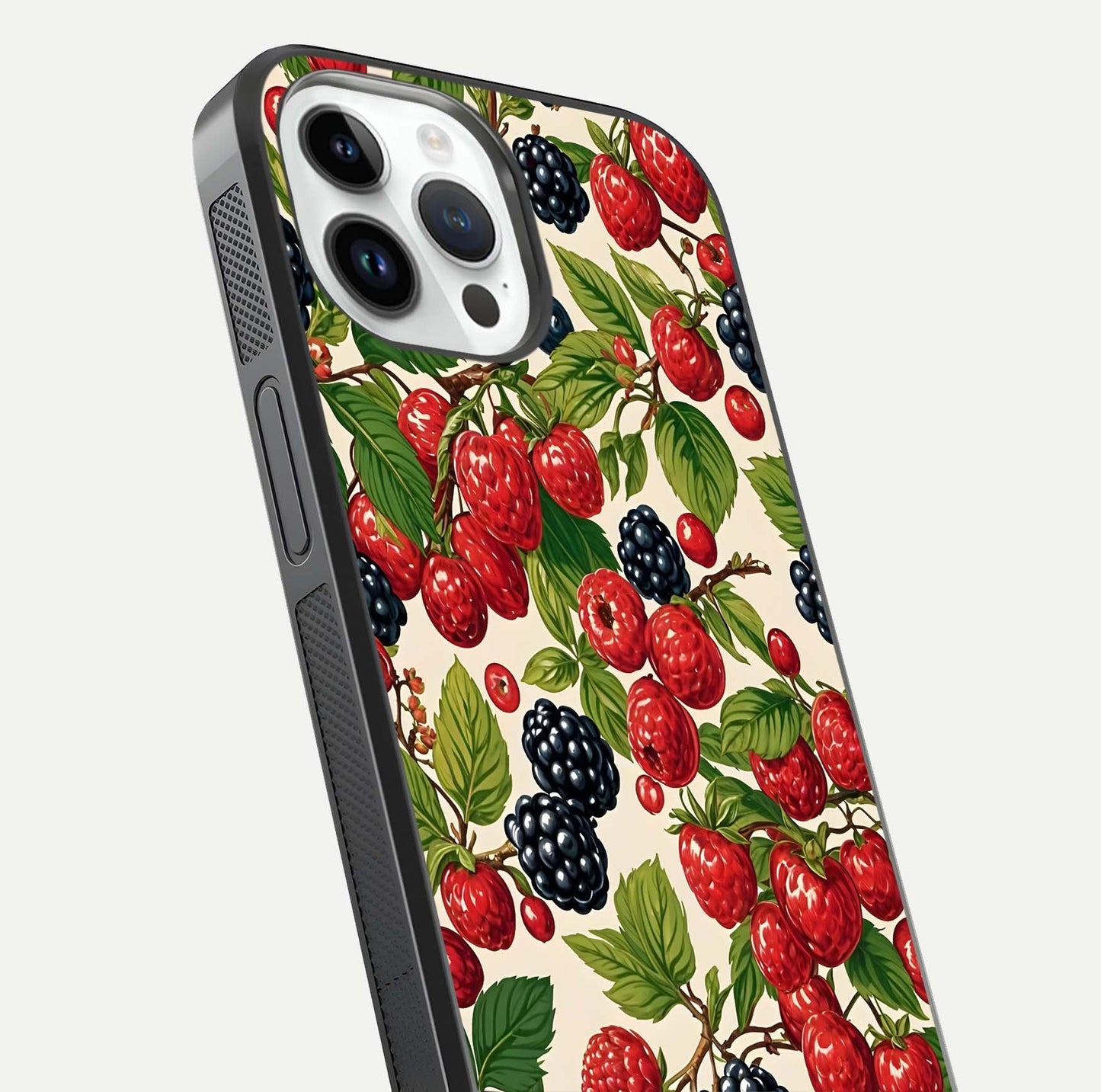 Mixed Berry Collage Glass Case for iPhone 14 Pro close-up angled shot showing fruit detail and reflection glow