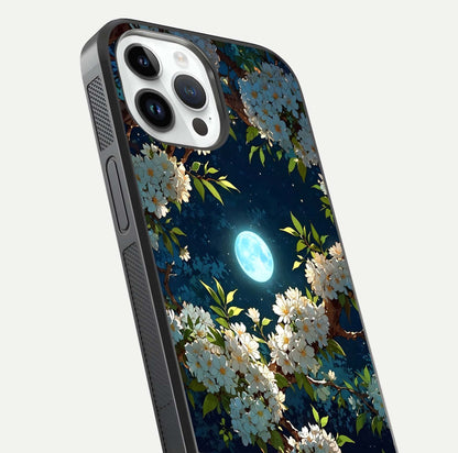 Moonlit Blossom Dream Glass Case for iPhone 14 Pro close-up angled shot showing glowing petals and reflection