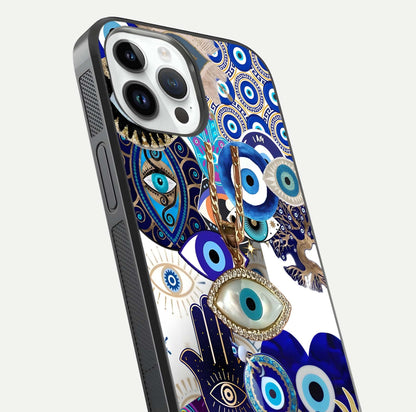 Mystic Charm Eye Glass Case for iPhone 14 Pro close-up angled shot showing detailed eye art and reflection