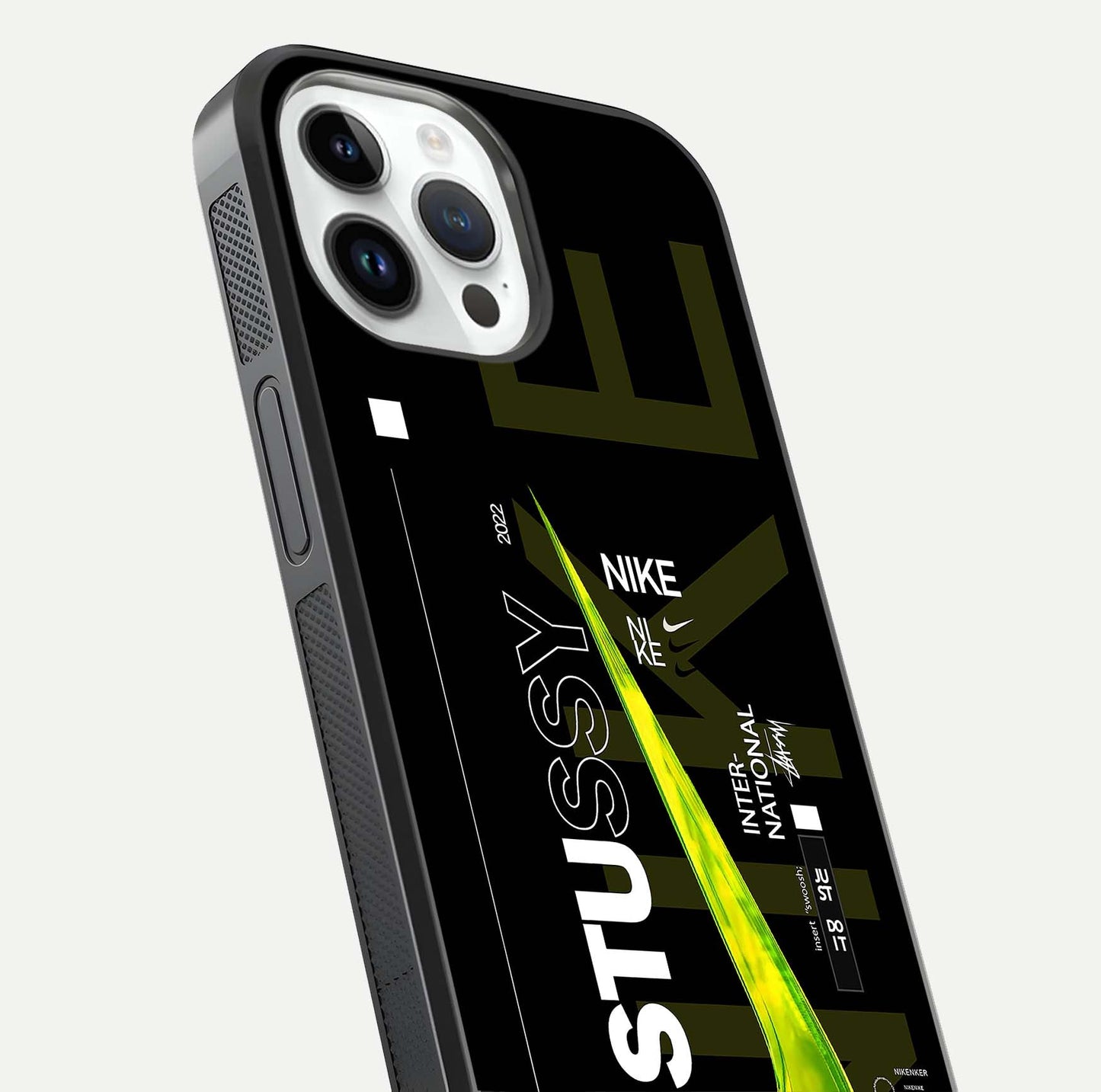 Neon Street Edition Glass Case for iPhone 14 Pro close-up angled shot showing urban neon lights and shine