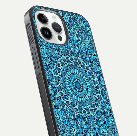 Ocean Bloom Mandala Glass Case for iPhone 14 Pro close-up angled shot highlighting detailed mandala and reflection