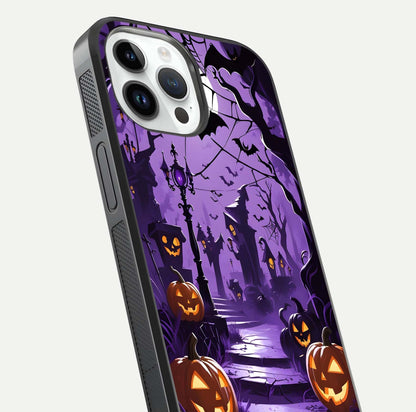 Pumpkin Patch Halloween Glass Case for iPhone 14 Pro close-up angled shot highlighting pumpkin texture and shine