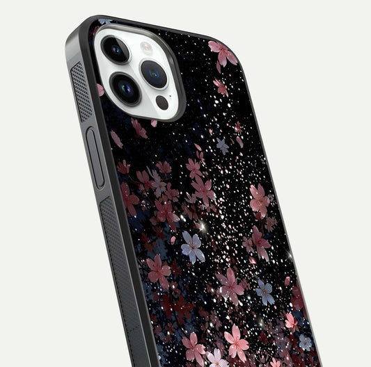 Starlit Flower Dreams Glass Case for iPhone 14 Pro close-up angled shot highlighting petal reflection and HD depth