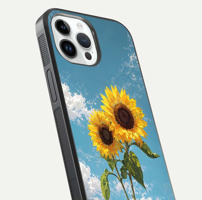 Sunflower Sky Bloom Glass Case for iPhone 14 Pro close-up angled shot highlighting petal details and reflection