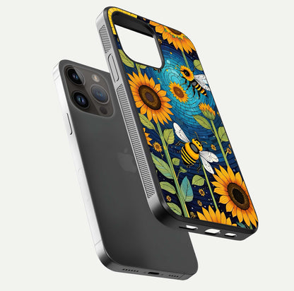 Bees & Sunflowers Glass Case for iPhone 16 Pro floating dual-view mockup displaying vibrant yellow tones and gloss texture
