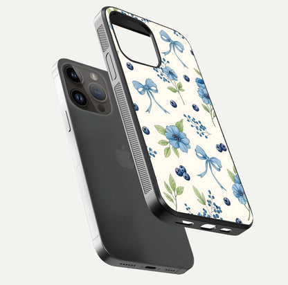Blue Flower & Bow Glass Case for iPhone 14 Pro Max floating mockup capturing gloss reflection and girly aesthetic