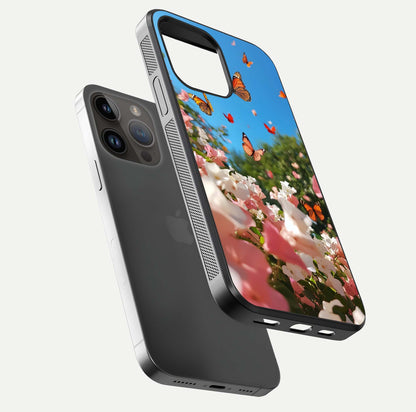 Butterflies in Bloom Sky Glass Case for iPhone 14 Pro Max floating mockup capturing butterfly motion and edge design