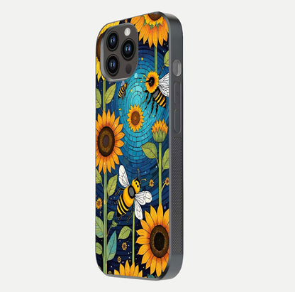 Bees & Sunflowers Glass Case for iPhone 16 Pro side-angle image showing bee pattern alignment and shiny protective surface