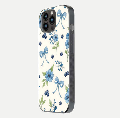 Blue Flower & Bow Glass Case for iPhone 14 Pro Max side-angle image showing bow-floral mix and HD finish shine