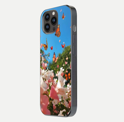 Butterflies in Bloom Sky Glass Case for iPhone 14 Pro Max side-angle image showing delicate details and gloss polish