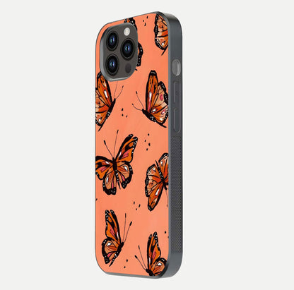 Coral Wing Butterfly Glass Case for iPhone 14 Pro Max side-angle photo showing reflective finish and smooth edges