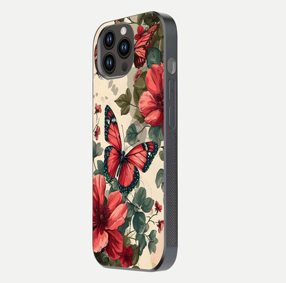 Crimson Butterfly Garden Glass Case for iPhone 14 Pro Max side-angle photo capturing gloss texture and soft tone