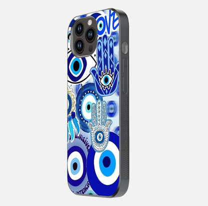 Evil Eyes Dream Glass Case for iPhone 14 Pro Max side-angle photo capturing smooth edges and reflective texture