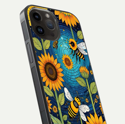 Bees & Sunflowers Glass Case for iPhone 16 Pro close-up angled shot showing detailed petals, bee prints, and glass reflection
