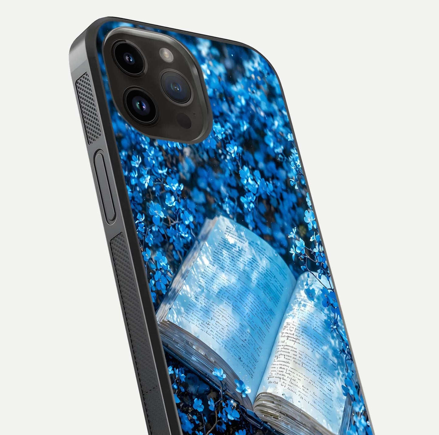Blue Bloom Tales Glass Case for iPhone 14 Pro Max close-up angle showing petal texture and blue tone reflection