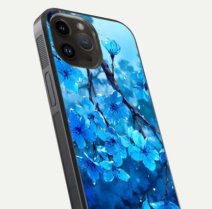 Blue Blossoms Branch Glass Case for iPhone 14 Pro Max close-up angle highlighting petal details and reflection gloss