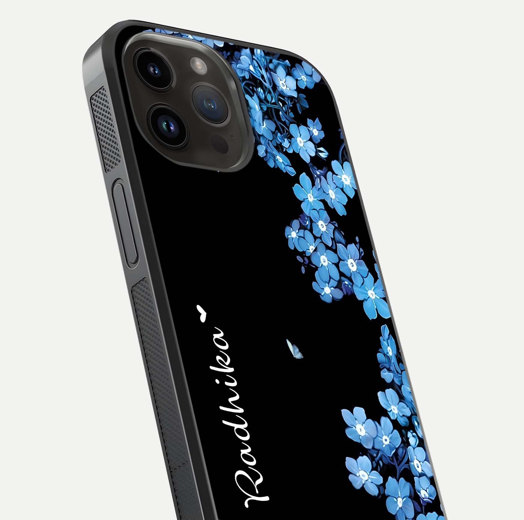 Blue Petal Dream Custom Name Glass Case for iPhone 14 Pro Max close-up highlighting petal texture and gloss reflection