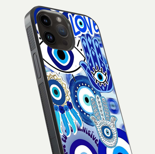Evil Eyes Dream Glass Case for iPhone 14 Pro Max close-up highlighting evil-eye charm detail and light reflection on glass
