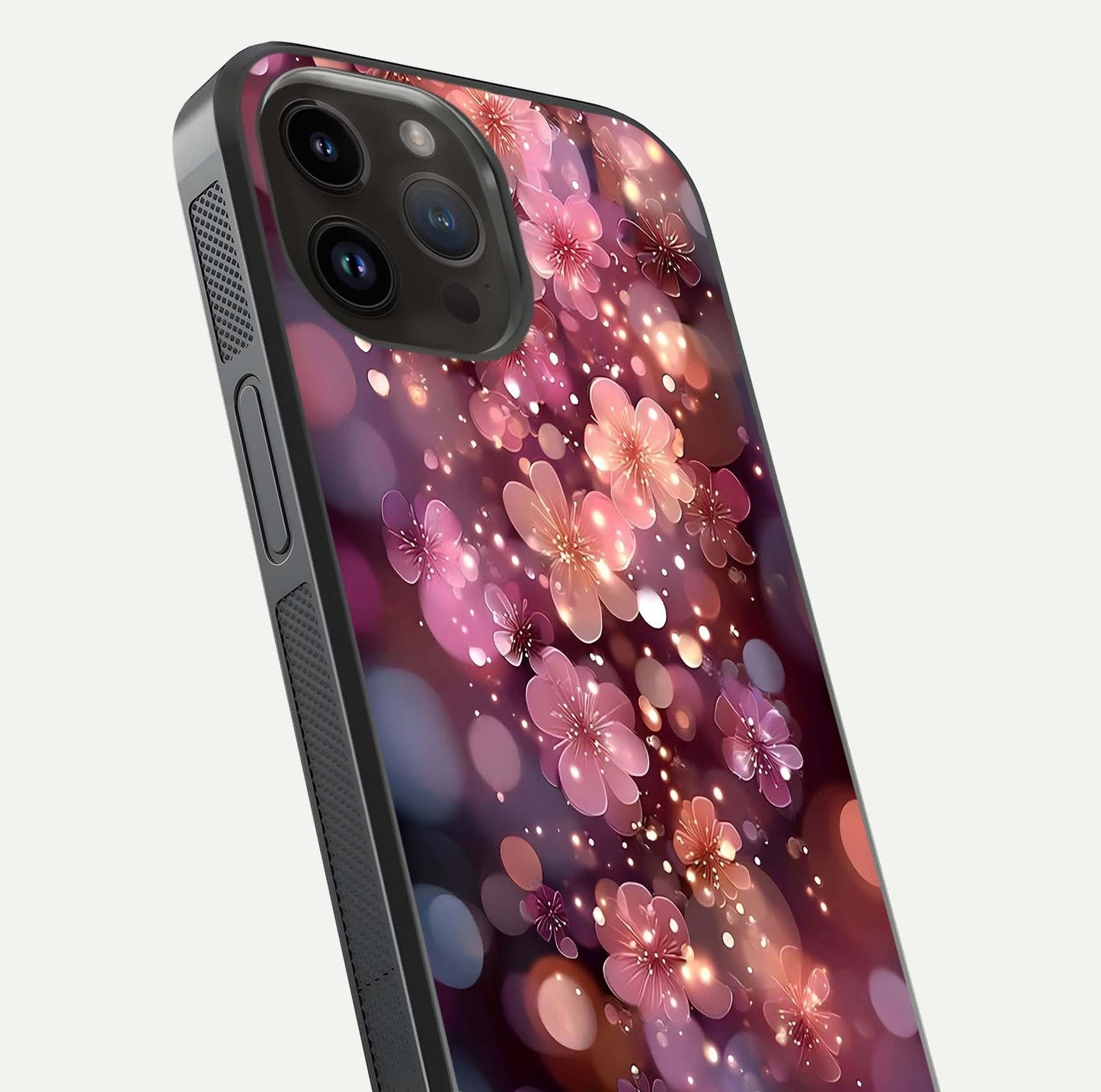 Glowing Petal Bliss Glass Case for iPhone 14 Pro Max close-up angled shot showing petal glow, color depth, and reflection shine