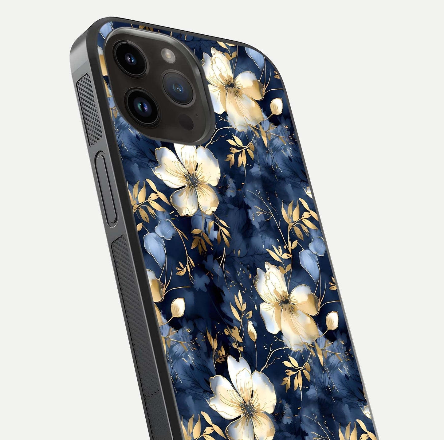 Golden Midnight Bloom Glass Case for iPhone 14 Pro Max close-up angled shot showing floral detail and reflection shine