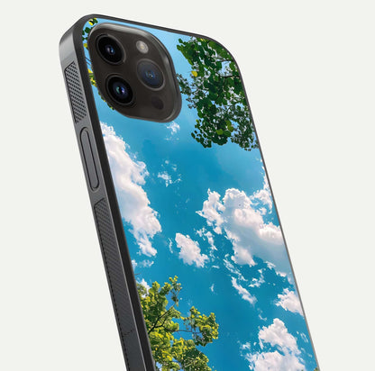 Greenery Sky Glass Case for iPhone 14 Pro Max close-up angled shot showing leafy tones and reflection brightness