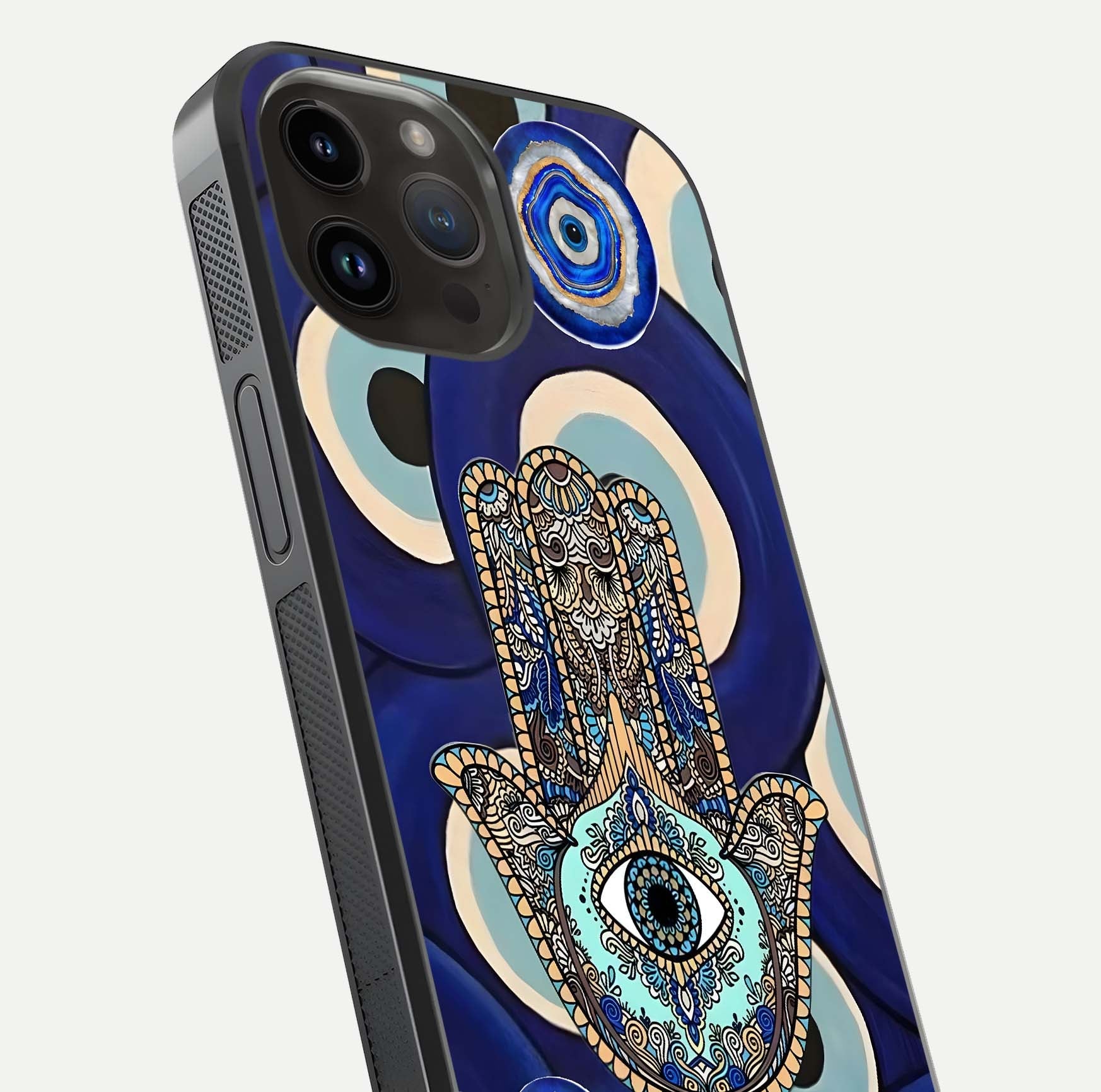 Hamsa Divine Guard Glass Case for iPhone 14 Pro Max close-up angled shot showing detailed palm motif and reflection glow
