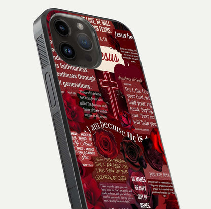 Jesus Love Heals Glass Case for iPhone 14 Pro Max close-up angled shot showing healing text, cross detailing, and reflection