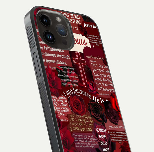 Jesus Love Heals Glass Case for iPhone 14 Pro Max close-up angled shot showing healing text, cross detailing, and reflection
