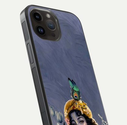 Lord Krishna Glass Case for iPhone 14 Pro Max angled close-up showing intricate flute and reflection details