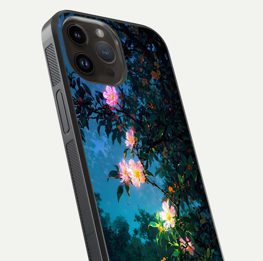 Midnight Bloom Glow Glass Case for iPhone 14 Pro Max close-up angled shot showing petal highlights and glow reflection