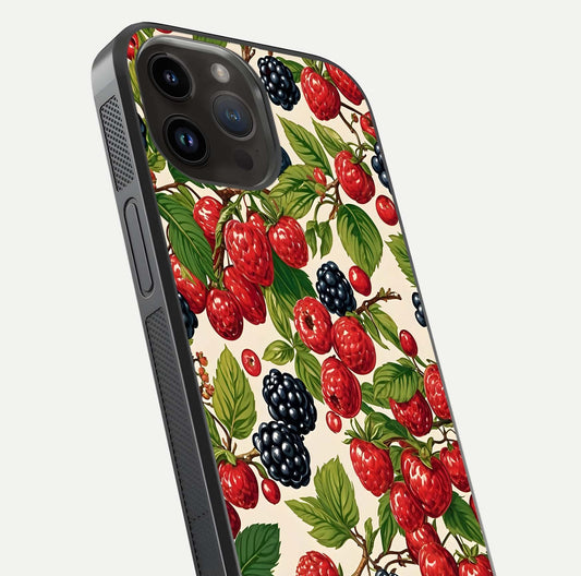 Mixed Berry Collage Glass Case for iPhone 14 Pro Max close-up angled shot showing fruit detail and reflection glow