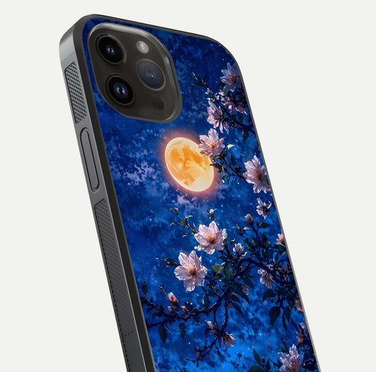 Moonlit Blossoms Night Glass Case for iPhone 14 Pro Max close-up angled shot showing petal glow and reflection detail
