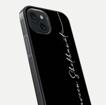 Black Tune Custom Name Glass Case for iPhone 15 close-up shot highlighting sleek monochrome design and reflection
