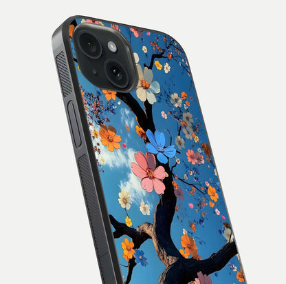 Blossom Dream Sky Glass Case for iPhone 15 close-up shot highlighting dreamlike clouds and pink blossoms
