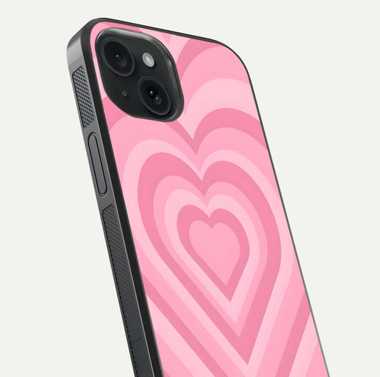 Blush Heart Waves iPhone 15  glass phone case angled back view highlighting romantic heart wave artwork and grip texture