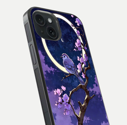 Celestial Bird Blossom Glass Case for iPhone 15 close-up capturing bird detail, petal reflection, and gloss shine