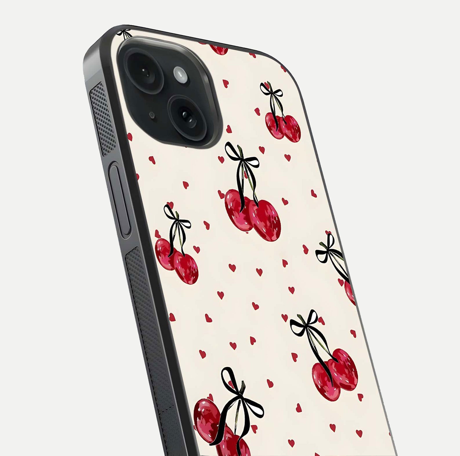 Cherry Heart Bow Glass Case for iPhone 15 close-up highlighting small bows, cherry red tones, and gloss shine