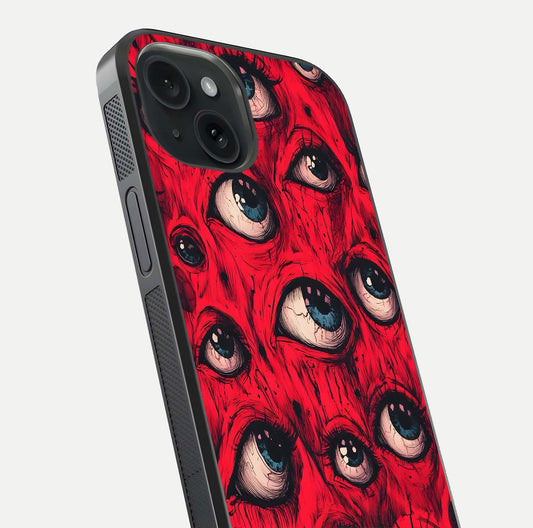Crimson Watch Eyes Glass Case for iPhone 15 close-up highlighting graphic detail and reflection