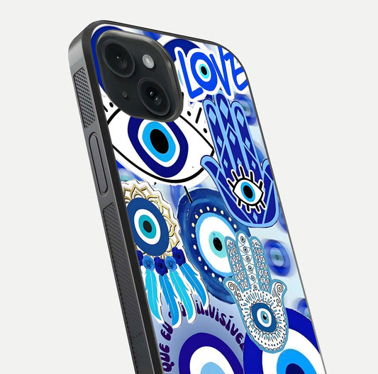 Evil Eyes Dream Glass Case for iPhone 15 close-up highlighting evil-eye charm detail and light reflection on glass