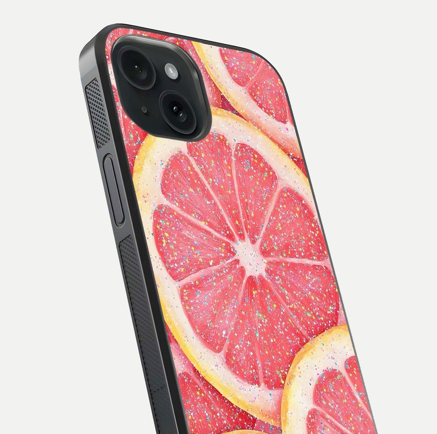 Glitter Grapefruit Glass Case for iPhone 15 close-up angled shot showing fruit texture and glitter reflection