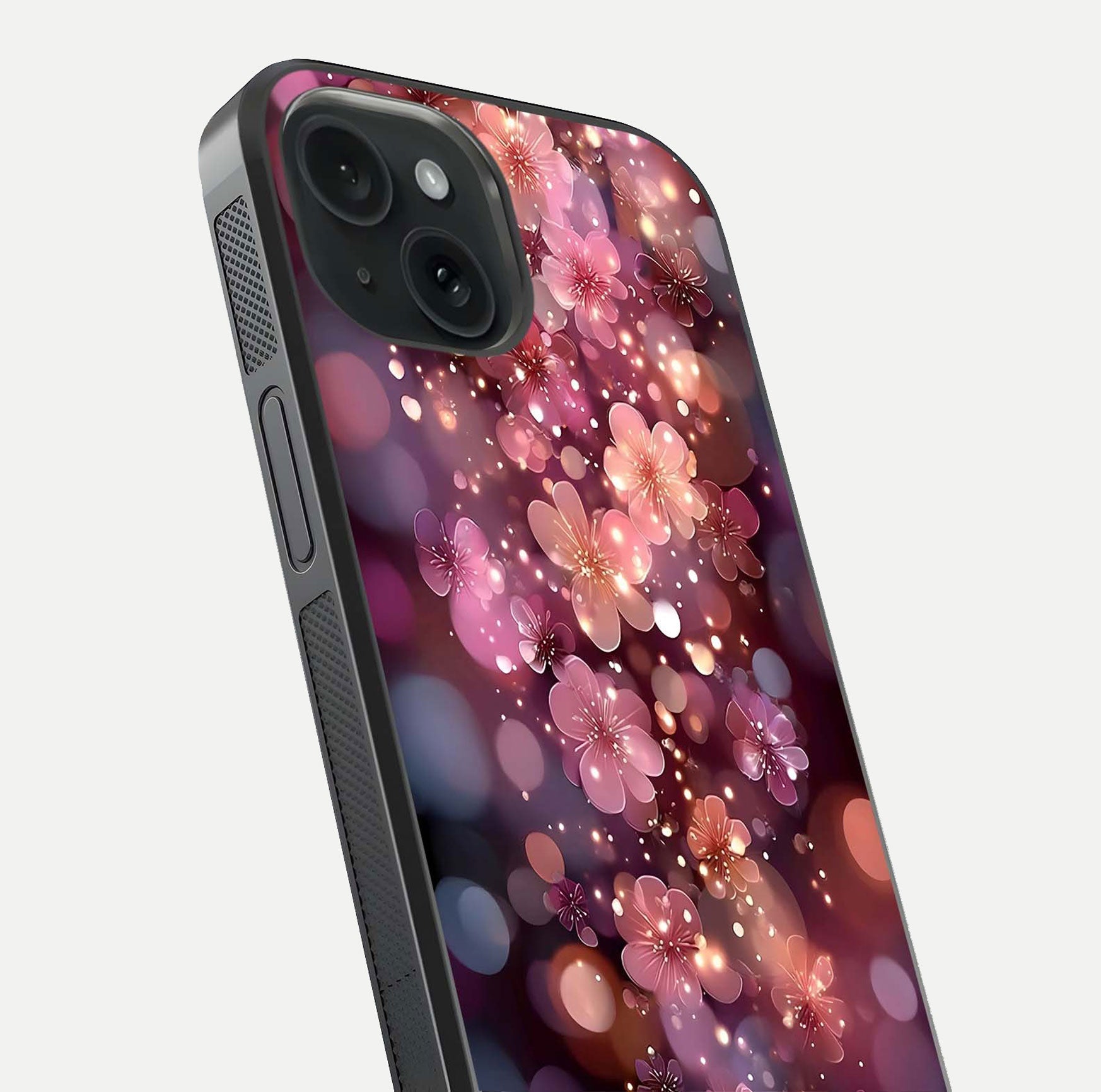 Glowing Petal Bliss Glass Case for iPhone 15 close-up angled shot showing petal glow, color depth, and reflection shine
