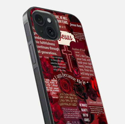 Jesus Love Heals Glass Case for iPhone 15 close-up angled shot showing healing text, cross detailing, and reflection