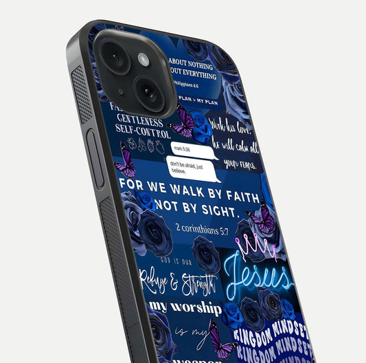 Kingdom Faith Glow Glass Case for iPhone 15 close-up angled shot showing luminous text and divine reflection