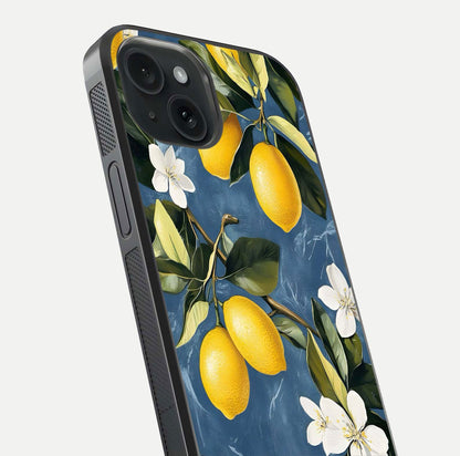 Lemon Dream Garden Glass Case for iPhone 15 close-up angled shot showing fruit details and shine reflection