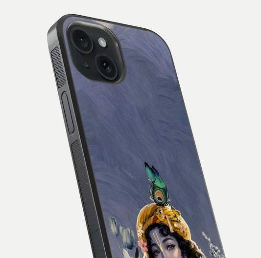 Lord Krishna Glass Case for iPhone 15 angled close-up showing intricate flute and reflection details