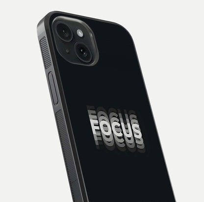 Mono Focus Vision Glass Case for iPhone 15 close-up angled shot highlighting minimal contrast and reflection