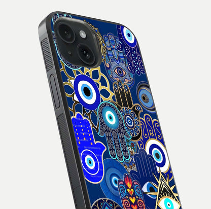 Mystic Palm Guard Glass Case for iPhone 15 close-up angled shot showing eye symbol and fine texture