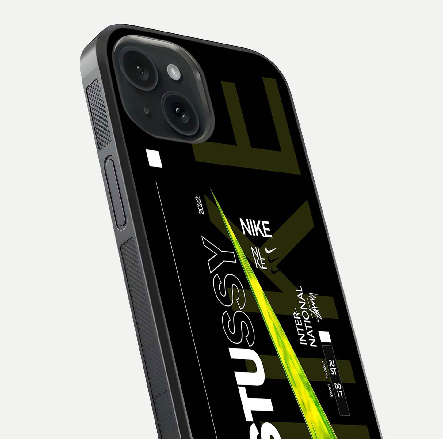 Neon Street Edition Glass Case for iPhone 15 close-up angled shot showing urban neon lights and shine