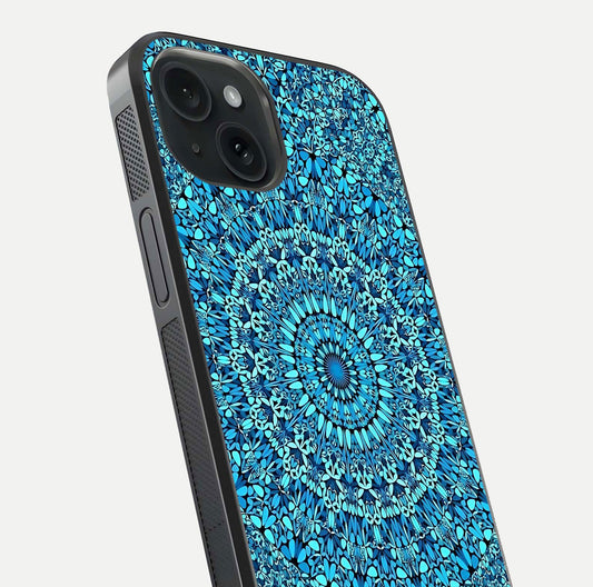 Ocean Bloom Mandala Glass Case for iPhone 15 close-up angled shot highlighting detailed mandala and reflection