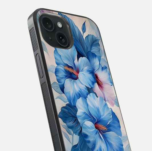 Ocean Hibiscus Grace Glass Case for iPhone 15 close-up angled shot highlighting floral glow and HD shine